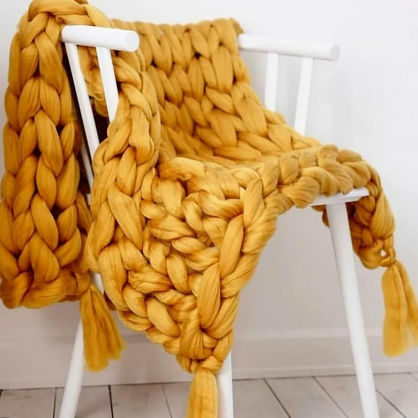 arm knitted blanket in mustard mammoth acrylic yarn 