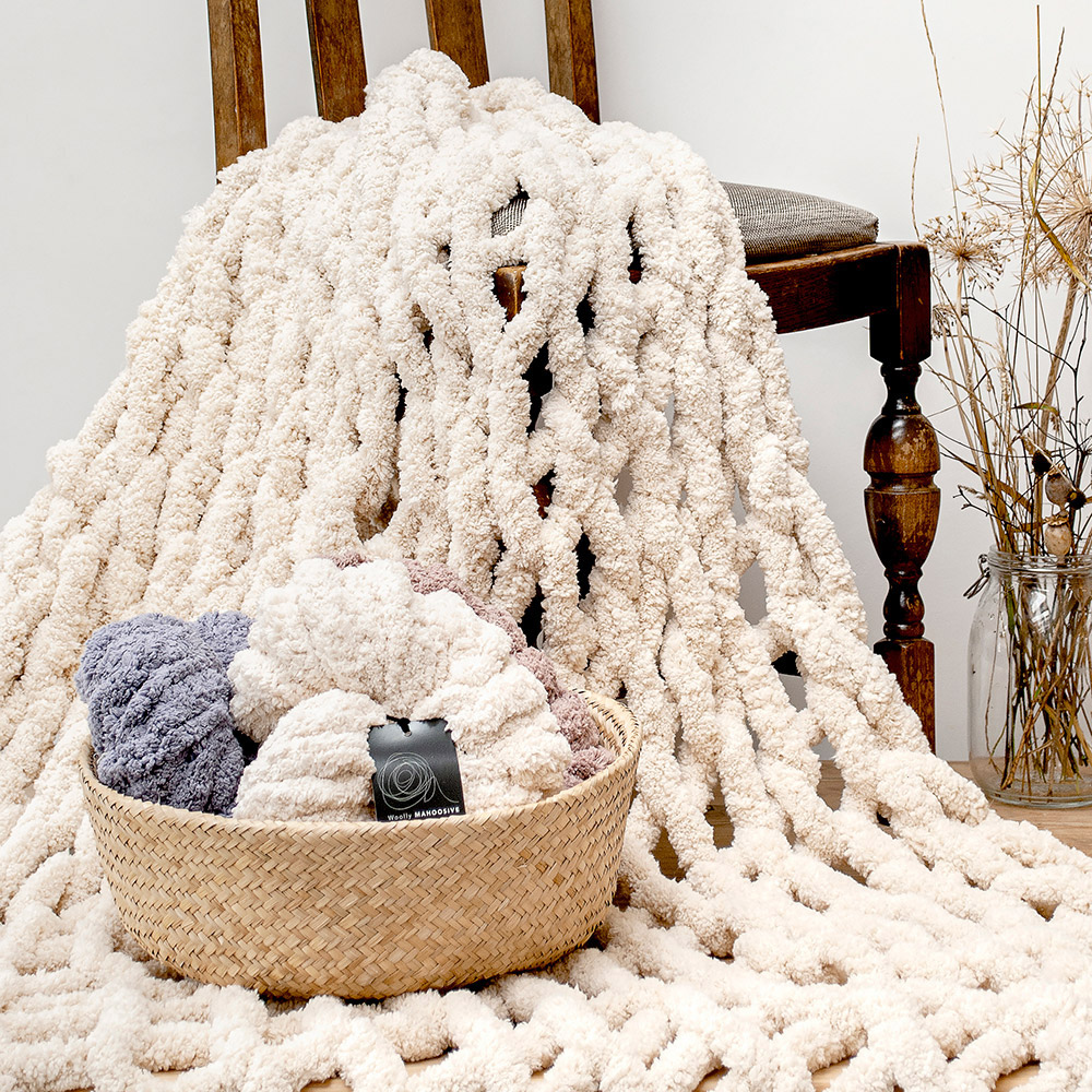 arm knitted blanket made with chunky chenille yarn 
