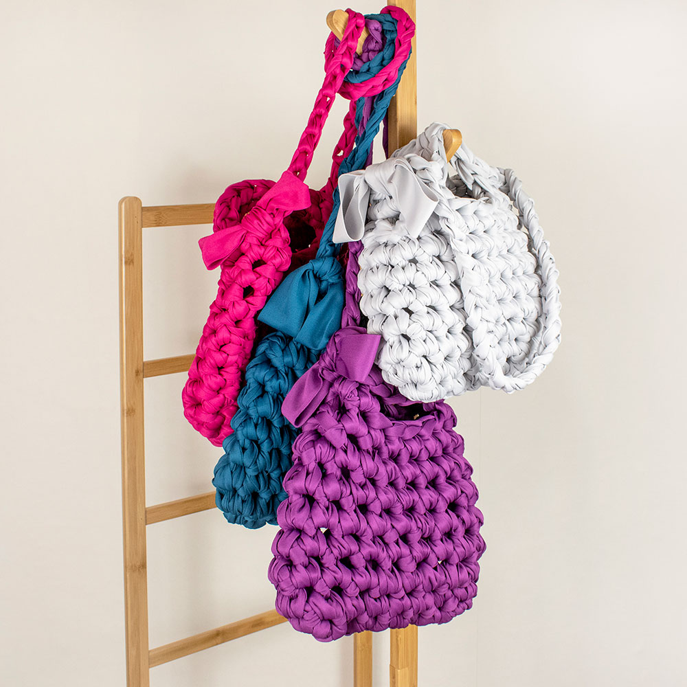 free crochet bag pattern made with luxurious smooth ribbon yarn by woolly mahoosive 
