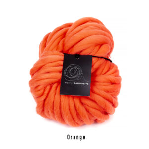 squiggly orange yarn used to crochet pumpkin